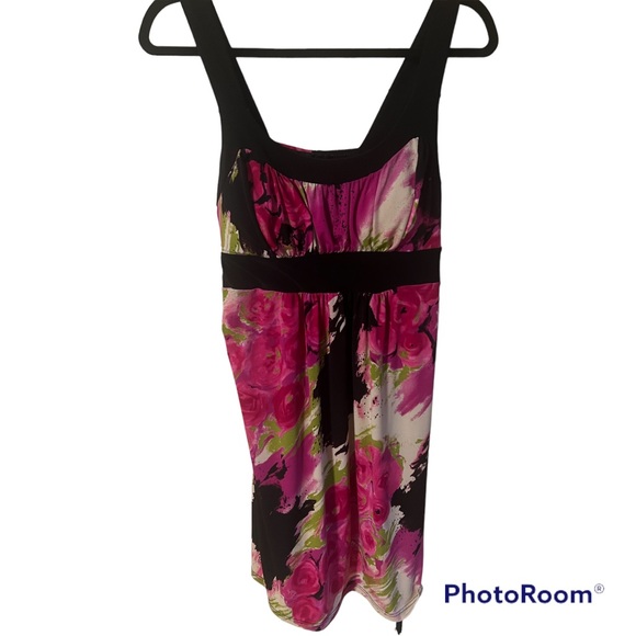 A cute dress that ties in the back by Bizz girl in a size small - Picture 2 of 7